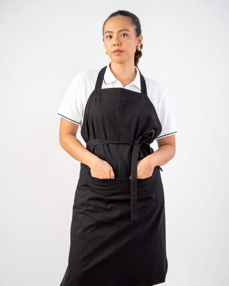black cotton bib apron, self-ties