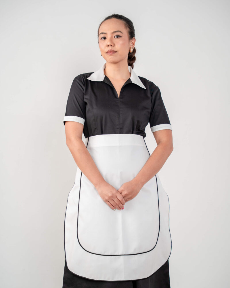 black shirt-dress with white contrast collar + white piped apron